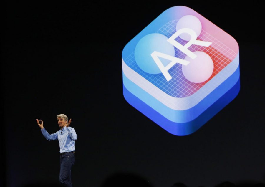 Apple Senior Vice President of Software Engineering Craig Federighi talks about augmented reality on Monday, June 5, 2017 at the Worldwide Developers Conference at the McEnery Convention Center in San Jose, California. The iPhone Xs augmented reality features have been lamented by critics as a disappointing miscalculation of focus by Apple, and served primarily as a flashy, but shallow spectacle. (Gary Reyes/Bay Area News Group/TNS)
