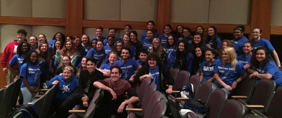 The students of the Warren Hills Advanced Concert Choir pose for a picture with music sensations, Sam Tsui and Casey Breves.  (Photo courtesy of Andrei Brenich)
