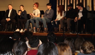Members from the cast of the fall production Farce of Habit perform a stage reading of the first scene of the show in front of the younger students attending the showcase.  (Photo by Ashley Sawyer)