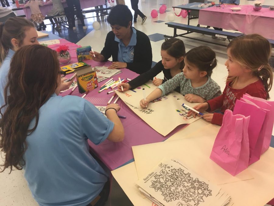 Glam Day was a fun-filled day for girls to feel good about themselves while supporting a great cause. Here is a photo of some of the girls at the coloring table, only one of seven events offered (Photo by Caila Grigoletti)