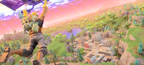 A player dropping from the Battle Bus to Tilted Towers, one of the most popular areas of the map. (Screenshot by Jessica Groelly)

