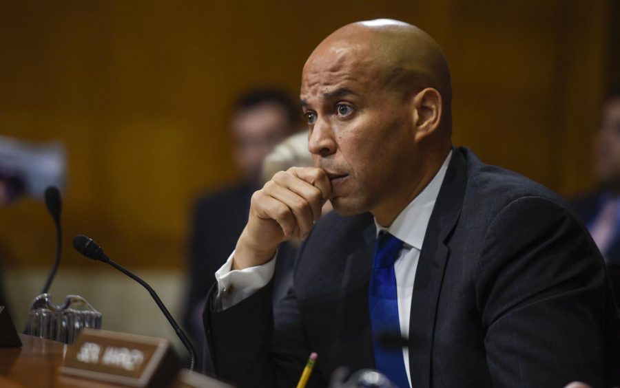 Senator Cory Booker (D-NJ) listens to Oklahoma Attorney General Scott Pruitt during the Senate Environment Committee, for his consideration to be Environmental Protection Agency Administrator on Jan. 18, 217 in the Dirksen Senate Office Building in Washington, D.C. (Riccardo Savi/Sipa USA/TNS)
