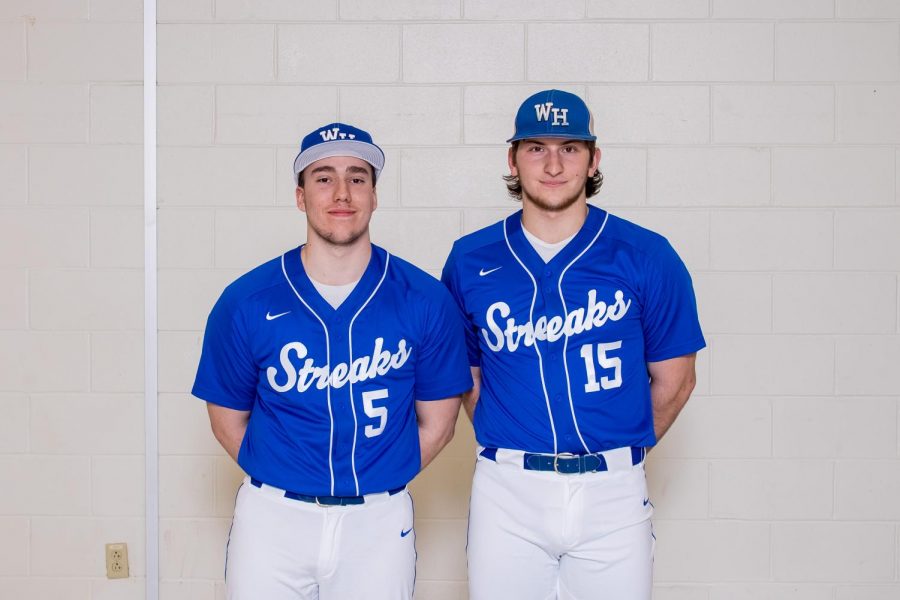 Looking forward to the next chapter of their career, Captains (left) Tommy Moore and (right) PJ Hanisak. Photo courtesy of Yearbook. 
