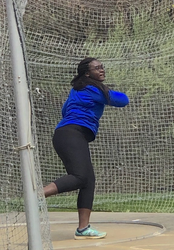 Eniola Ajayi throws her discus at the Randolph Relays. (Photo by Hannah DeVoe) 