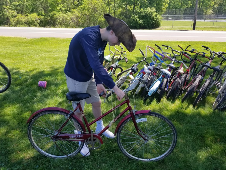 In early May, Mr. Detrick’s Chess Club helped package bikes he collected throughout the year for Pedals for Progress. “We had our most successful drive to date with 145 bikes, 58 sewing machines and $2126 to help shipping costs to Albania,” he said. “We really have some absolutely amazing students. They worked hard for nearly four hours to process all those bikes which included taking off all the pedals, lowering the seat and turning down the handle bars. It was a great day with so many activities going on at the high school.” 
