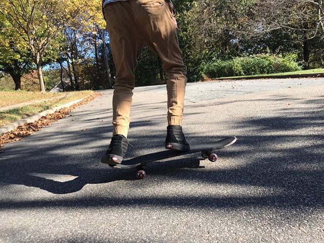 This Warren Hills student practices his ollie, a skateboard trick, on a street in Washington. (Photo courtesy of Kayleen Oviedo)