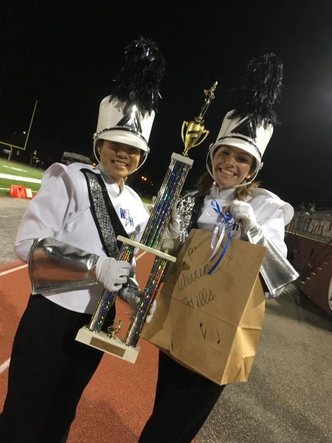 Drum Major Joyce Lin (left) and Assistant Drum Major Emma Sloan (right) showing their eyes with pride at their award. (Photo by Sofia Senesie) 