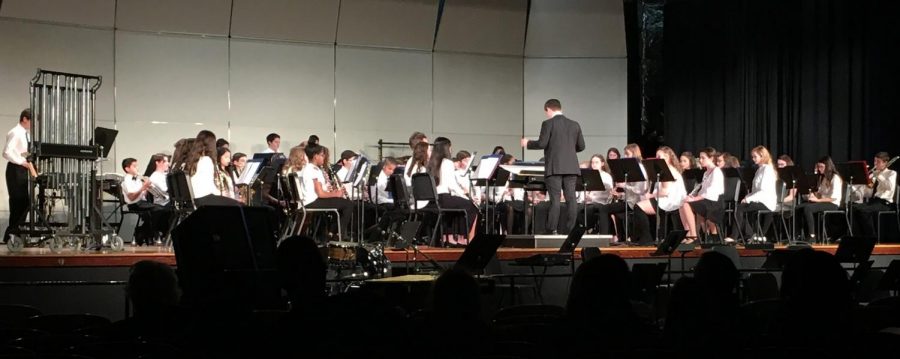 The+Warren+Hills+Regional+Middle+School+Concert+Band+and+Jazz+Ensemble+performed+at+their+Winter+Concert+in+the+high+school+auditorium+Jan.+15.+The+Concert+Band+played+eight+selections%2C+one+of+which+was+%E2%80%9CSweet+Caroline%E2%80%9D+by+Neil+Diamond.+Eighth-grader+Hunter+Patti%2C+who+gave+the+introduction+for+%E2%80%9CSweet+Caroline%2C%E2%80%9D+informed+the+audience+that+they+could+%E2%80%9Cfeel+free+to+join+in+on+the+%E2%80%98so+goods%E2%80%99+and+the+Ba-Ba%E2%80%99s.%E2%80%9D+The+Jazz+band+performed+%E2%80%9CAbsolutely%2C+Positively%E2%80%9D+by+Gregory+Yasinitsky+and+%E2%80%9CKansas+City%E2%80%9D+by+Jerry+Leiber+and+Mike+Stoller.+Rio+Riano%2C+an+eighth-grade+alto+and+baritone+saxophone+player%2C+performed+solos+for+both+Jazz+Band+songs.+Haley+Branflick+and+Clara+Woodruff%2C+both+eighth-grade+flutists%3B+Olivia+Raia%2C+eighth-grade+piccoloist+and+flutist%3B+Frank+Cignarella%2C+seventh-grade+trumpeter%3B+and+Lukas+Liakhovitch%2C+seventh-grade+saxophonist%2C+played+solos+for+%E2%80%9CEncanto%E2%80%9D+by+Robert+W.+Smith.+Gianna+Marinelli%2C+an+eighth-grade+percussionist%2C+played+a+solo+for+%E2%80%9CAppalachian+Folk+Dance%2C%E2%80%9D+also+by+Robert+W.+Smith.+%E2%80%9CWe+had+some+music+that+was+quite+challenging%2C%E2%80%9D+said+Band+Director+Jason+Graf.+%E2%80%9CIt+wasn%E2%80%99t+perfect%2C+but+it+all+came+together+and+worked+out.%E2%80%9D+%28Photo+by+Stephanie+Dunlap%29