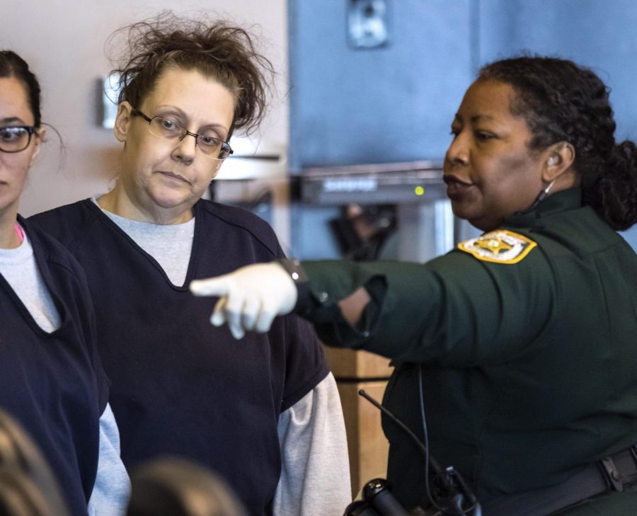 Kristen Meyer, the woman charged with first-degree murder in the starvation death of her 13-month-old daughter, Tayla Aleman, is brought into court for a pre-triall hearing Friday, February 28, 2020, before her death penalty trial set for March 13. (MCT/ LANNIS WATERS/palmbeachpost.com)
