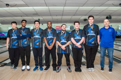 Coach Garcia, far right, stands with the Boys’ Bowling Team after taking second place in the Hunterdon-Warren-Sussex Tournament at Sparta Lanes on Jan 19. 
