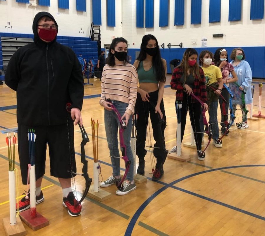 Members of the Warren Hills Archery Team refine their archer technique during a recent practice in the high school’s auxiliary gym.