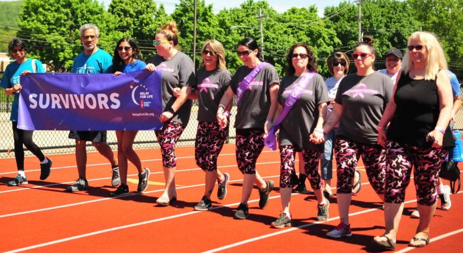 Participants+in+the+2019+Relay+for+Life+%E2%80%93+the+last+year+Warren+Hills+participated+in+the+national+event+%E2%80%93+walk+relay+laps+on+the+Warren+Hills+track.+%28Photo+courtesy+of+Elisha+Stenger%29