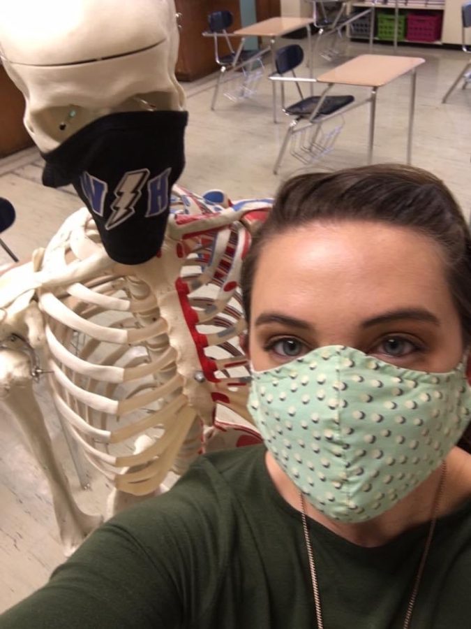 Alexandra+Helle+and+her+skeleton+prop+are+masked+up+and+ready+to+teach+Anatomy+and+Physiology%21+Helle+said+that+the+photo+%E2%80%9Csums+up+teaching+through+COVID.%E2%80%9D