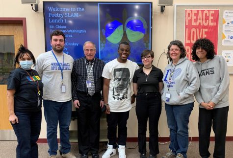 Each reader at the Poetry Slam had their own story to tell and poetry helped them to share it.
Left to Right:  Mrs. Bela Shah, Mr. Carmello Chiara, Mr. Andrew Oakley, sophomore Tyrik Iman-Washington, sophomore Roisin McCluskey, Ms. Maggie Devine and sophomore Josue Alvarez.  