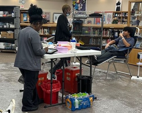 The high school library was busy Dec. 6 as the Key Club ran a blood-donation drive. (Photo by Priscilla Lucci)
