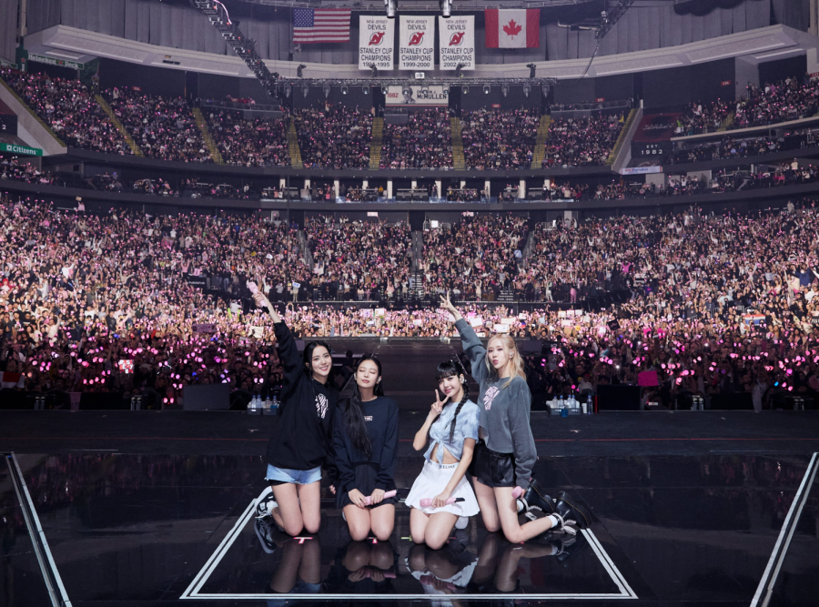 Blackpink are all smiles as they pose with their fans, some of whom are holding up signs and banners at the end of their memorable concert at the Prudential Center. (Photo courtesy of YG Entertainment)