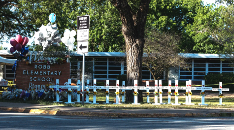 Crosses outside of the Robb Elementary School in Uvalde, Texas, honoring the students and staff who were fatally shot on 24 May, 2022. This was the most recent deadly shooting in America, and the deadliest since the Sandy Hook shooting of 2012— another consequence of the weak gun control and worsening gun violence in many parts of America. (Jordan Vonderhaar/Time/MCT)