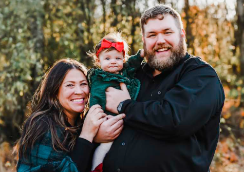 From left to right: Jennifer Russell posing with her daughter Stella and husband Jake. She and her husband were married in December, 2020 in Savannah, Georgia, and Stella was born May 4, 2022. (Photo courtesy of Jennifer Russell)