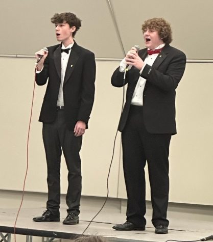 Ian Higgins and Connor Farrington singing “Lilys Eyes” during Cabaret Night. They also each sang a song separately and were a part of other duets during the event. (Photo by Sophie Picone)