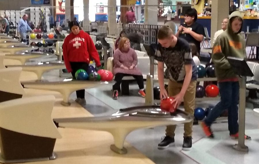 Members of the Warren Hills Best Buddies club warm up for a Unified Bowling competition at Oakwood Lanes in Washington. (Photo courtesy of Andy Oakley)