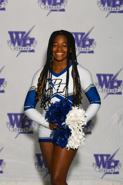 Boykin smiles for the camera as she enters her senior year cheer season (Photo Courtesy of Lors Photography)