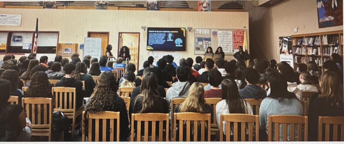 The students are listening as the presenters start the showcase. (Photo by Olivia Kerner) 